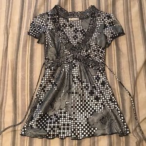 Black and white dotted silk blouse